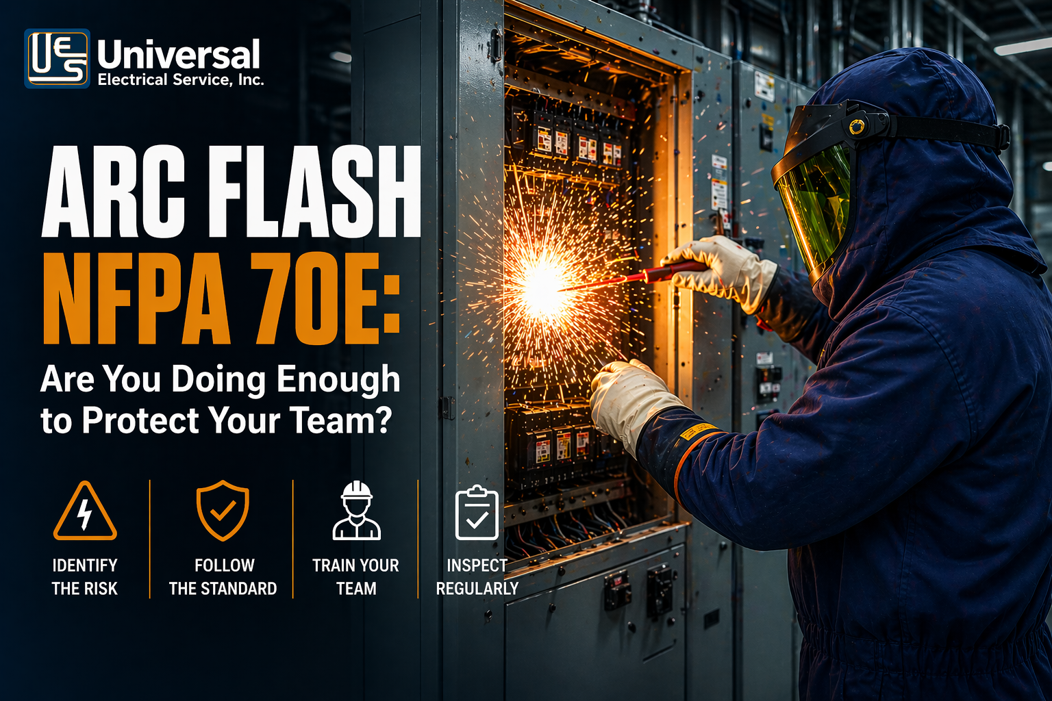 Industrial electrician wearing full arc flash PPE working on an energized electrical panel with visible sparks in a factory environment