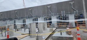 Electrical construction work outside a data center facility, supporting critical power infrastructure and future expansion.